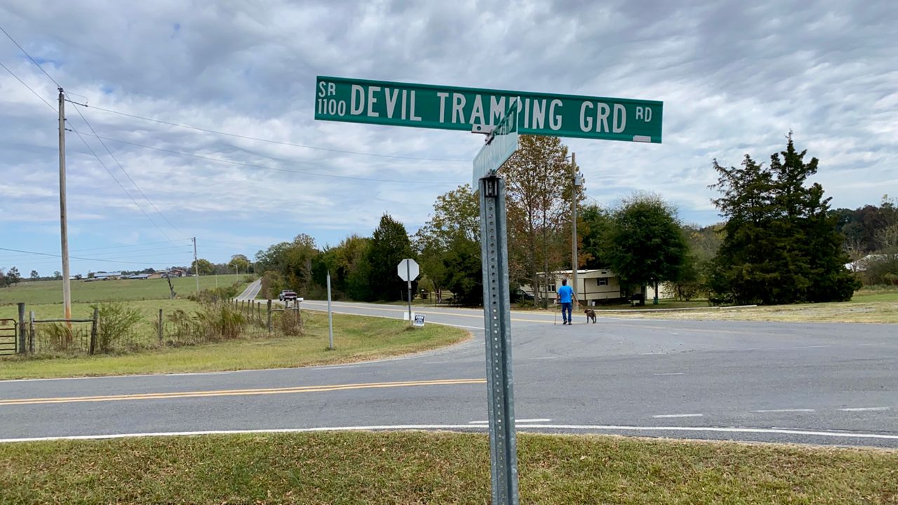 Wooden sign at Devil’s Tramping Ground
